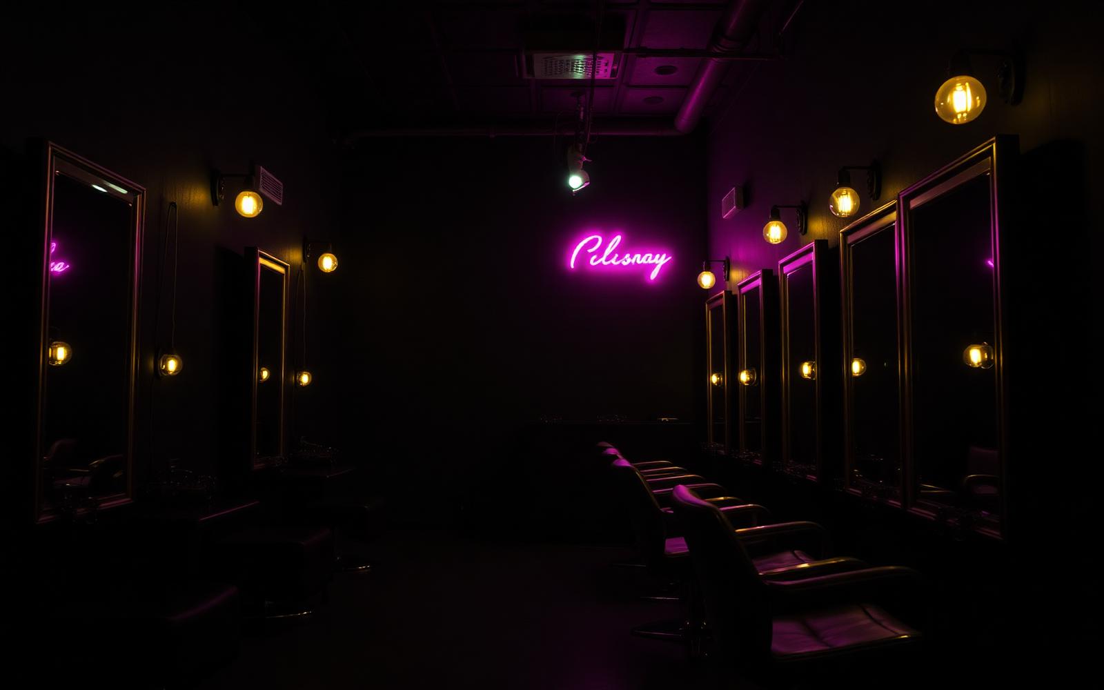Interior of the Pelo De Rose salon at night